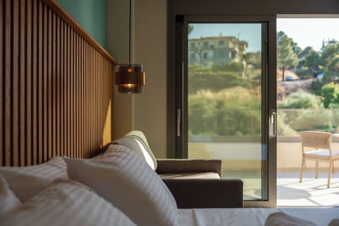 Junior Room, 1 Queen Bed with Sofa bed, Balcony | In-room safe, desk, free WiFi, bed sheets