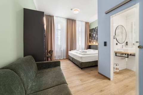 Deluxe Double Room, 1 King Bed, Non Smoking, Private Bathroom | In-room safe, individually decorated, individually furnished, desk