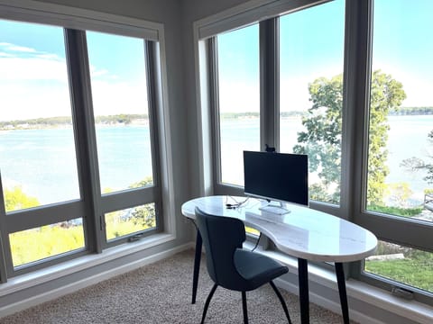 Enjoy incredible views at the desk in MBR.  Equipped with 27" monitor & webcam