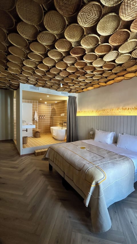 Deluxe Room, Balcony, City View | Minibar, in-room safe, individually decorated, individually furnished