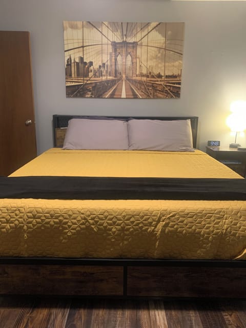 King size bed, end table and lamp with built in usb ports, smart tv, desk