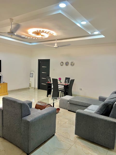 Deluxe Apartment, 2 Bedrooms | Living area | 50-inch LCD TV with digital channels, streaming services
