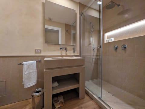 Superior Room | Bathroom | Shower, rainfall showerhead, designer toiletries, hair dryer
