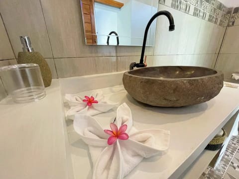 Shower, rainfall showerhead, towels, soap