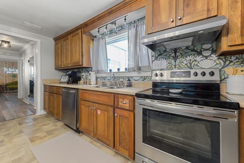 The kitchen has plenty of space for cooking meals