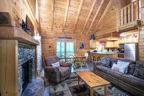 Living Room: Experience mountain views and warmth by the fireplace in this inviting cabin retreat!