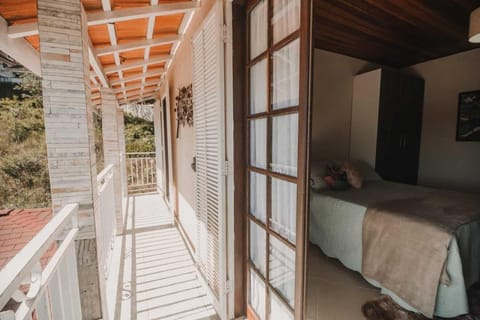 Comfort Quadruple Room, Balcony, City View | Living area