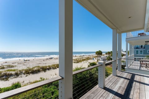 Oceanfront covered deck located off bedroom 1.  Middle level.