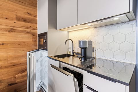 Superior Suite | Private kitchenette | Espresso maker, electric kettle, highchair