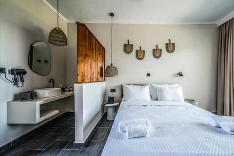 Family Room, Garden View | In-room safe, desk, laptop workspace, blackout drapes