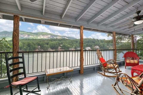 The upper level screened in porch has the best views of Lake Lure.