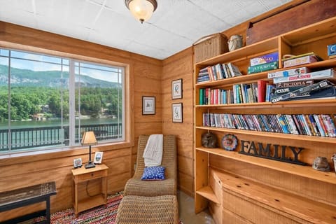 Reading nook with books and board games for a quiet night in.