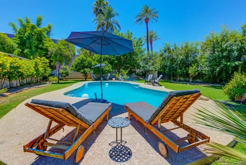 Beneath the star-studded sky, our yard transforms into an ethereal sanctuary - the pool's gentle ripples mirroring constellations while the gazebo offers a cozy retreat for nighttime reverie