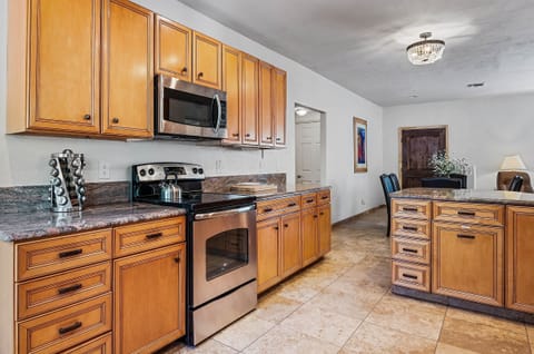 Full kitchen with electric stove