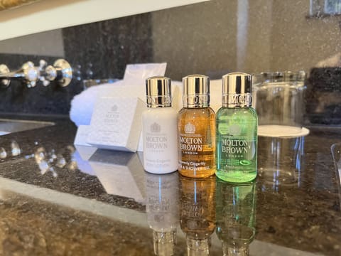 Hair dryer, bathrobes, slippers, towels