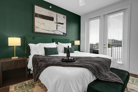 Bright and elegant bedroom designed for comfort and relaxation in this furnished apartment.