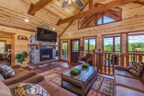 Cabin, Multiple Beds, Hot Tub, Mountain View (Serenity Mountain Pool Lodge) | Living area | 65-inch TV with digital channels, fireplace, video-game console