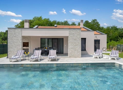Villa (Villa SABINA - Santalezi - Three Bedr) | Outdoor pool | Seasonal outdoor pool, sun loungers