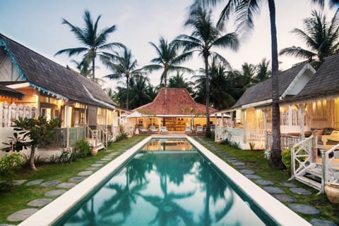 Outdoor pool, pool umbrellas, sun loungers
