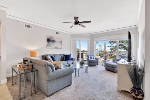 One of the best unobstructed ocean views on the island, overlooking the Atlantic Ocean, the pool, and the lagoon with immaculate Lowcountry landscaping.