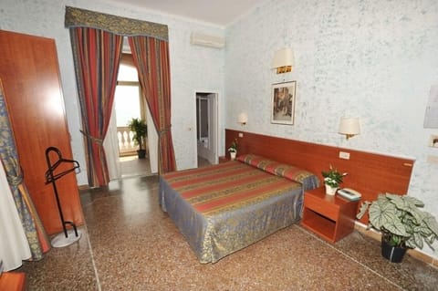 Superior Double Room, Sea View | Minibar, in-room safe, desk, blackout drapes