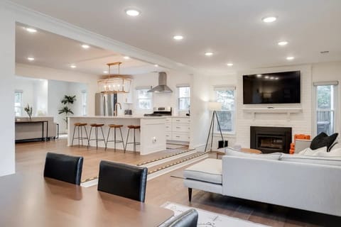 Living Room: A beautifully bright and expansive living room designed for comfort, light, and effortless relaxation.