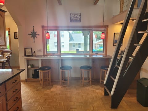 KITCHEN:  The home has a modern kitchen with all major appliances including a dishwasher and a good supply of cooking and dining utensils.