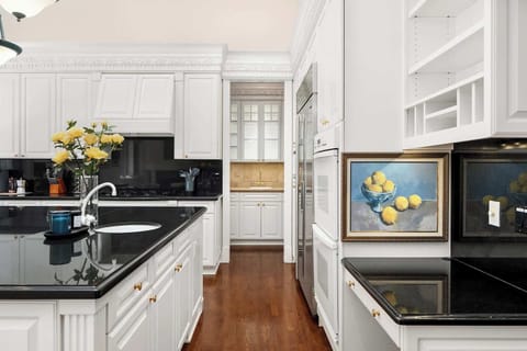 Prepare delicious meals in our gourmet kitchen featuring top-of-the-line appliances and ample counter space