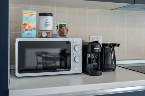 Apartment, Patio, Garden View | Private kitchen | Fridge, microwave, oven, stovetop