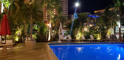 Outdoor pool, pool umbrellas, sun loungers