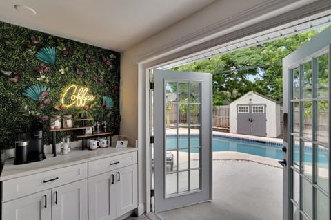 Coffee Bar With Backyard Pool View