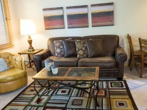 Kick back your feet and relax in the cozy living area.