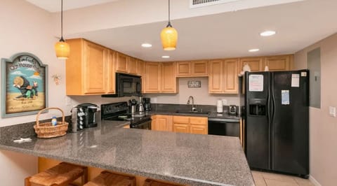 "Spacious Kitchen with breakfast bar."