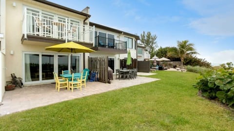 "View of the master balcony and back patio."
