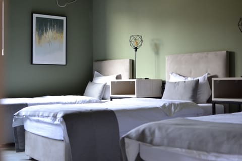 Basic Triple Room | In-room safe, free WiFi, bed sheets