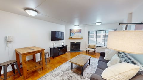 Furniture, Indoors, Living Room, Screen, Table
