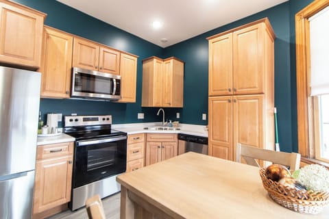 One Bedroom Apartment Unit 1 | Private kitchen | Full-size fridge, microwave, oven, stovetop