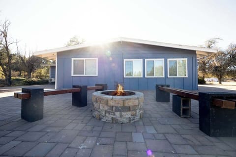 The Western vacation rental in Payson, AZ, fire-pit to relax and unwind. 
