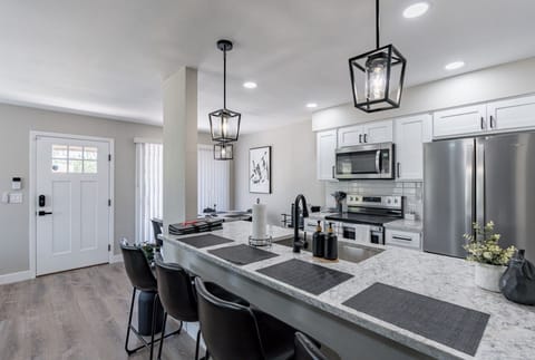 Well equipped and stocked kitchen for home cooked meals or snacks on the run.