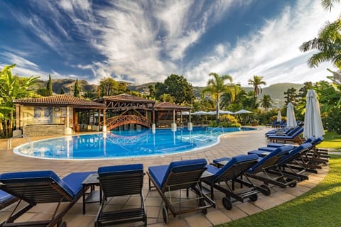 Indoor pool, outdoor pool, pool umbrellas, sun loungers