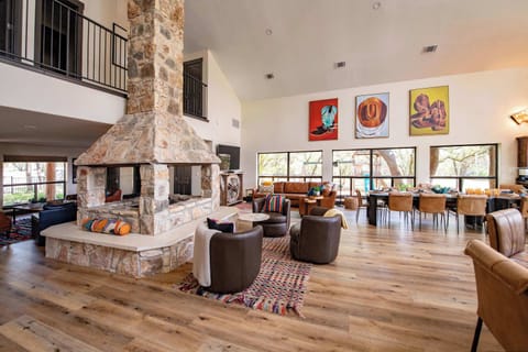 Exclusive access to the full 12-acre Gathering - soaring ceilings, a grand stone fireplace, and room for everyone to stay connected.