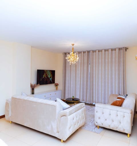 Family Apartment | Living area | 24-inch Smart TV with digital channels