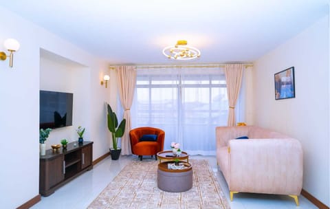 Deluxe Apartment, Balcony, City View | Living area | 32-inch Smart TV with digital channels