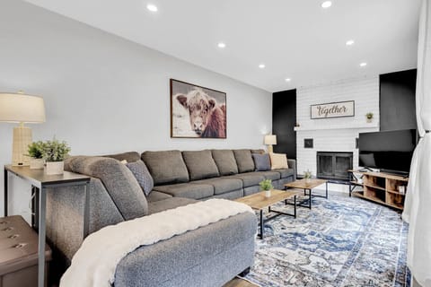 Spacious living room with modern design and ample seating