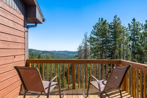 Welcome to your scenic mountain retreat in Evergreen, a separate upper level in a two-story hillside cabin.