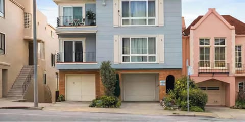 Charming city home with classic architecture and a welcoming entrance, located in a vibrant neighborhood close to everything.