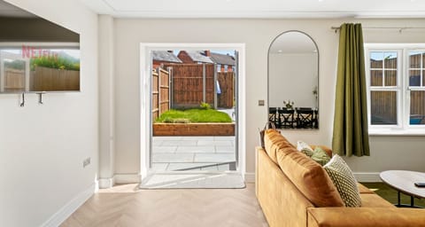 Premium House, 4 Bedrooms, Patio | Living area | 50-inch Smart TV with digital channels, Netflix, streaming services