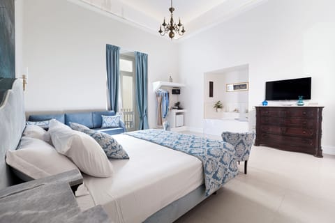 Premium bedding, down comforters, Select Comfort beds, free minibar