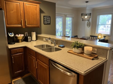 Kitchen with counter height bar with seating