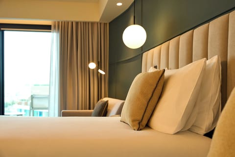 Premium Twin Room, Balcony, City View | Minibar, in-room safe, desk, laptop workspace